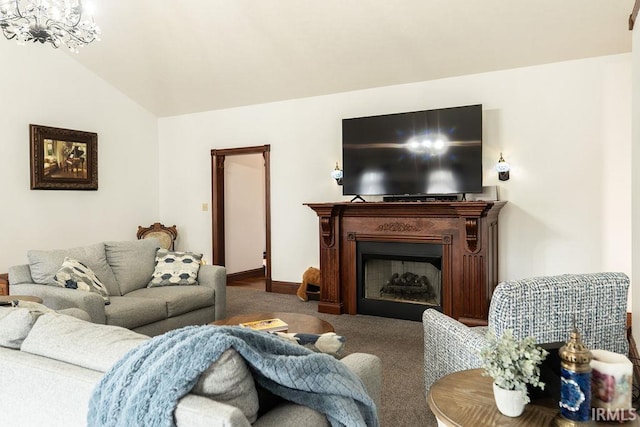 living room with carpet flooring, vaulted ceiling, and an inviting chandelier