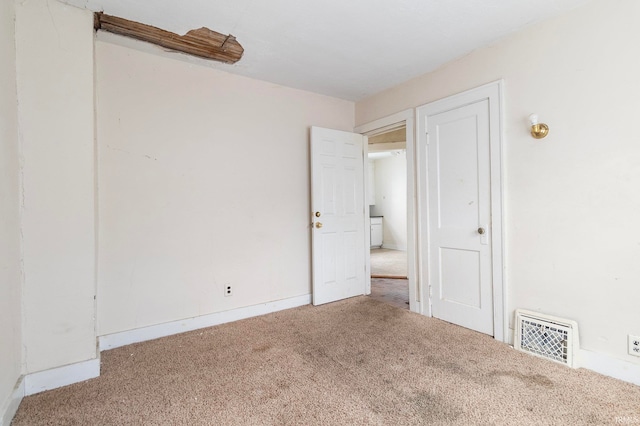 empty room featuring carpet