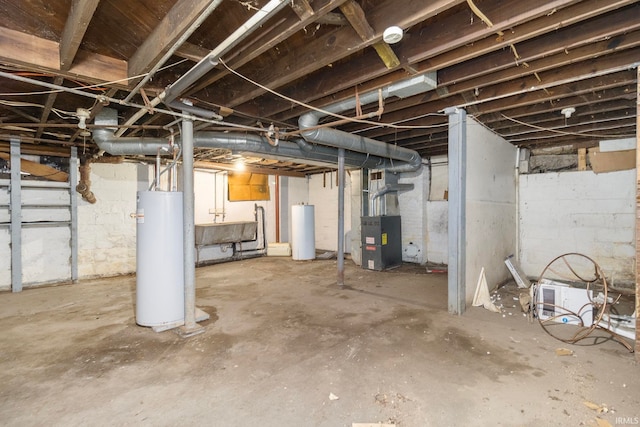 basement featuring gas water heater, sink, and heating unit