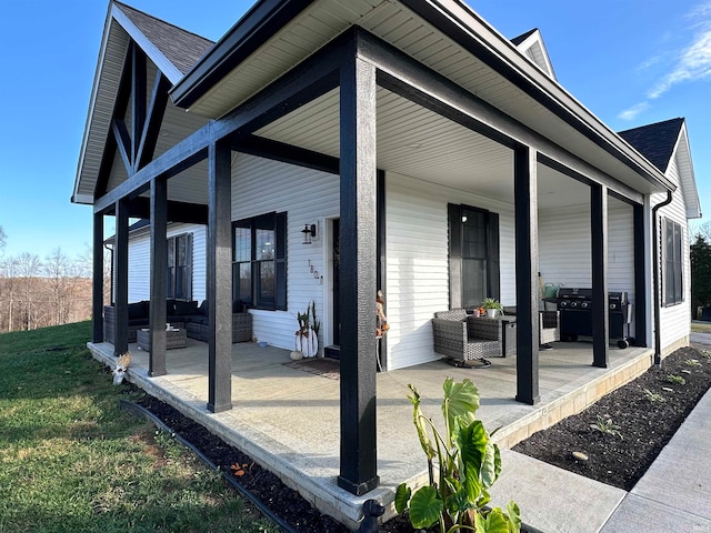 exterior space with an outdoor living space and a patio area