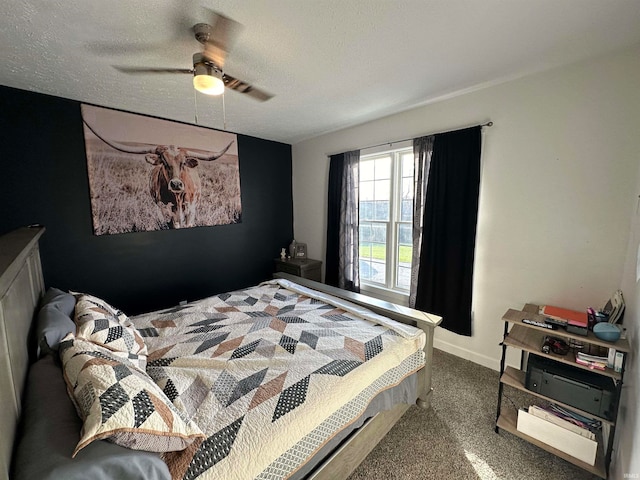 bedroom featuring a textured ceiling and ceiling fan