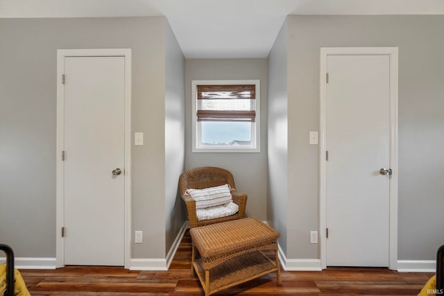 living area with dark hardwood / wood-style floors