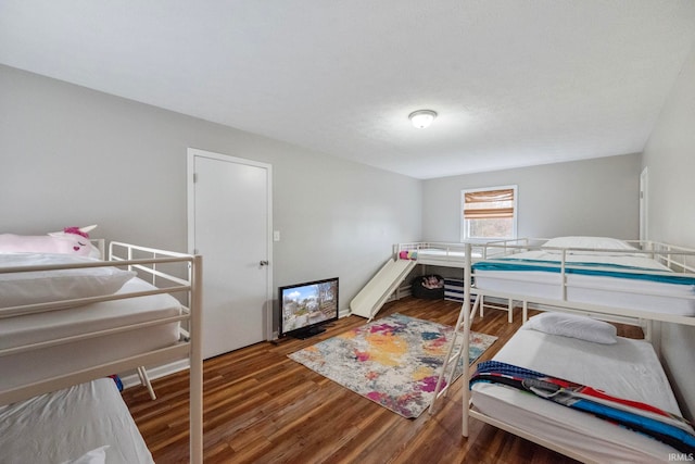 bedroom featuring dark hardwood / wood-style floors