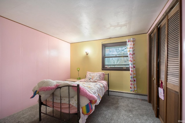 bedroom featuring carpet flooring and a baseboard radiator