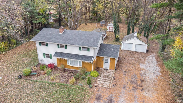 view of front of house with an outbuilding and a garage