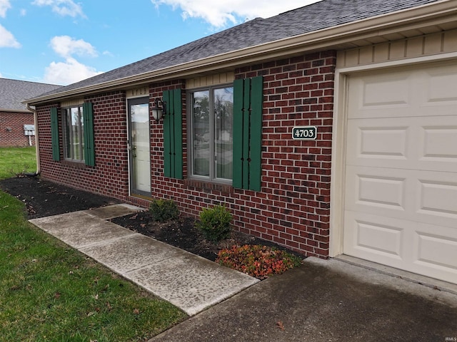 property entrance featuring a garage