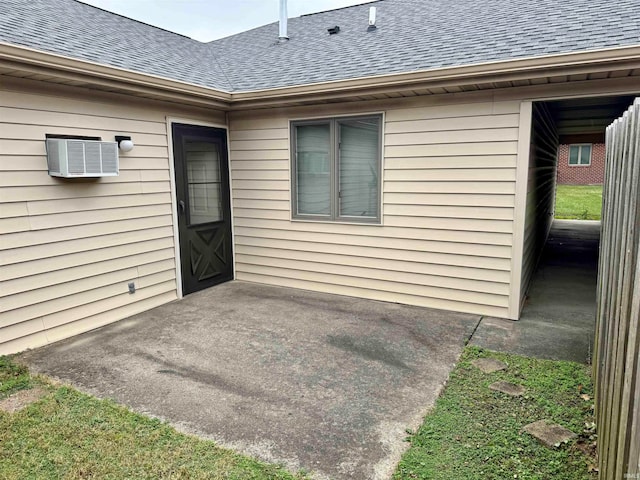 doorway to property featuring a wall mounted air conditioner