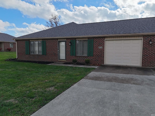 single story home featuring a front lawn and a garage