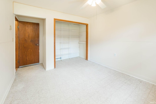 unfurnished bedroom with a closet and ceiling fan