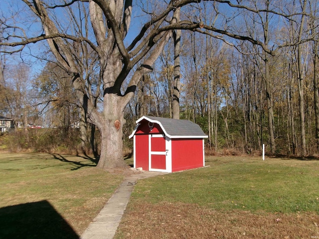 view of outdoor structure with a lawn