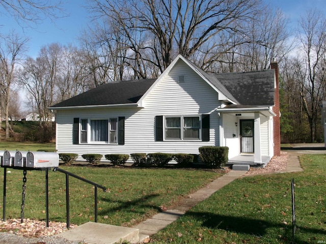 view of front of home with a front lawn