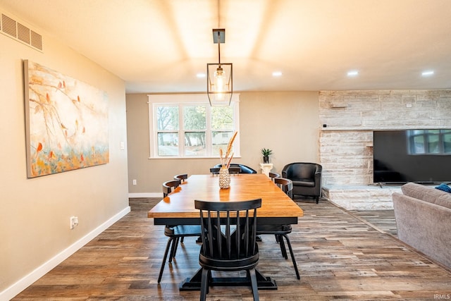 dining area with wood-type flooring