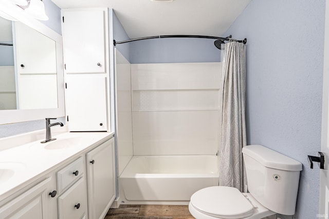 full bathroom with vanity, hardwood / wood-style floors, shower / bathtub combination with curtain, and toilet