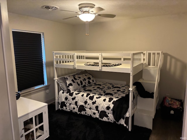 bedroom featuring ceiling fan