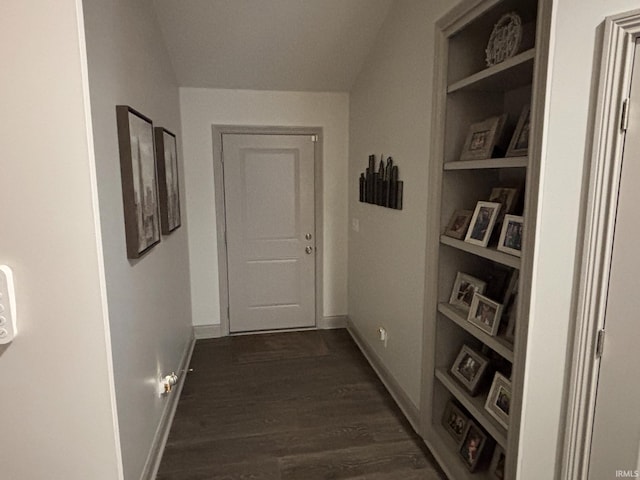 corridor with dark wood-type flooring