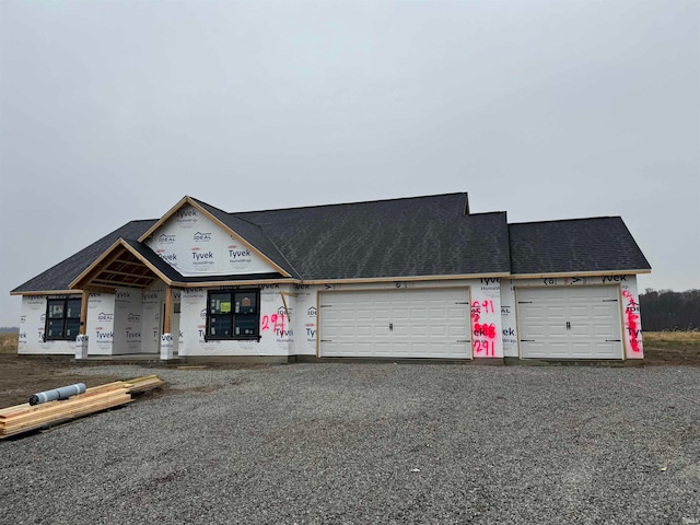 view of front of property with a garage