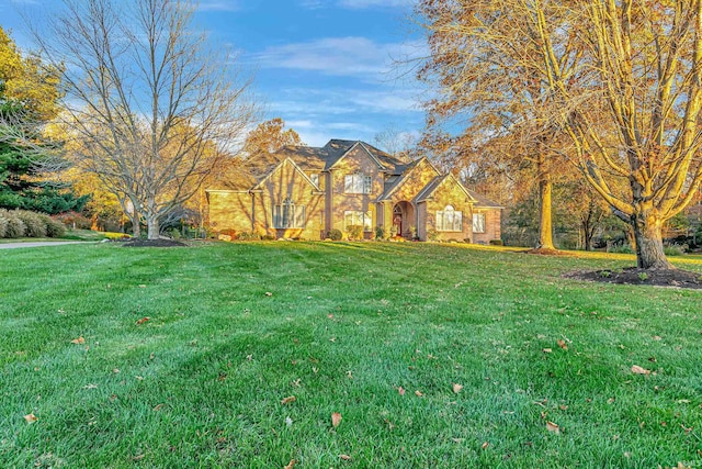 view of front of home with a front lawn