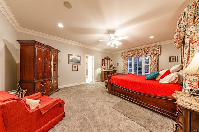 carpeted bedroom with ceiling fan and crown molding