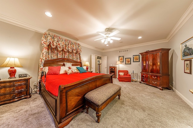 carpeted bedroom featuring ceiling fan and ornamental molding