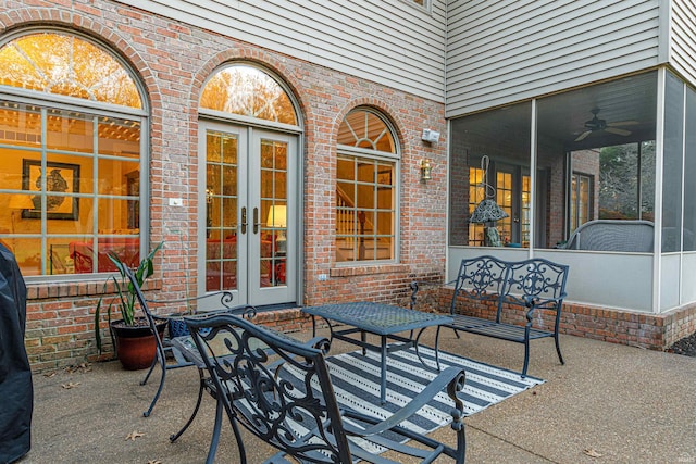 view of patio featuring ceiling fan and french doors