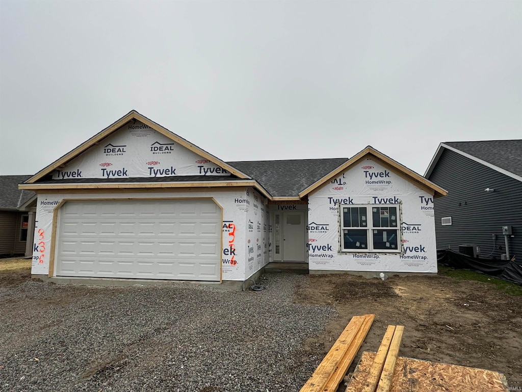 property under construction with a garage