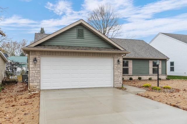 ranch-style home featuring a garage