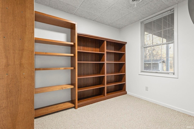 interior space with a drop ceiling