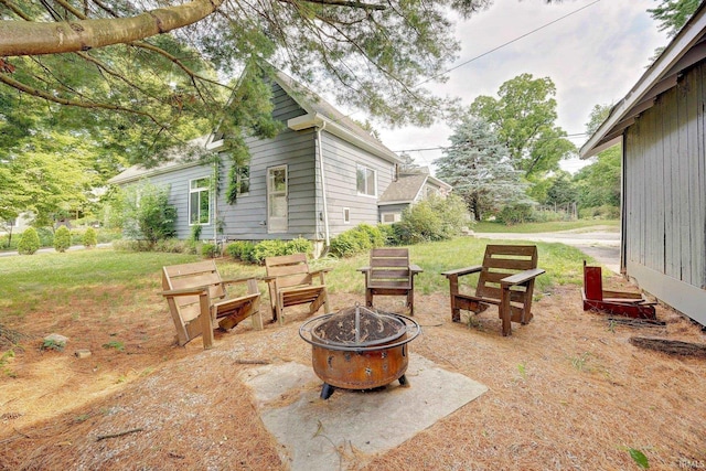 view of patio / terrace with an outdoor fire pit