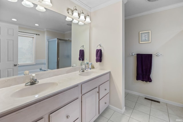 bathroom featuring tile patterned floors, vanity, separate shower and tub, and ornamental molding