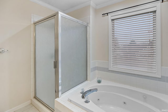 bathroom with crown molding and independent shower and bath