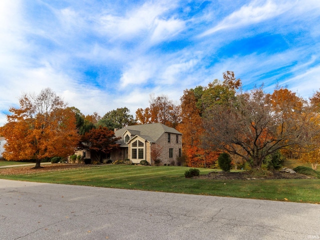 view of front of home with a front lawn