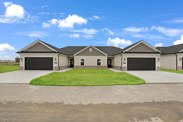 single story home with a garage and a front yard