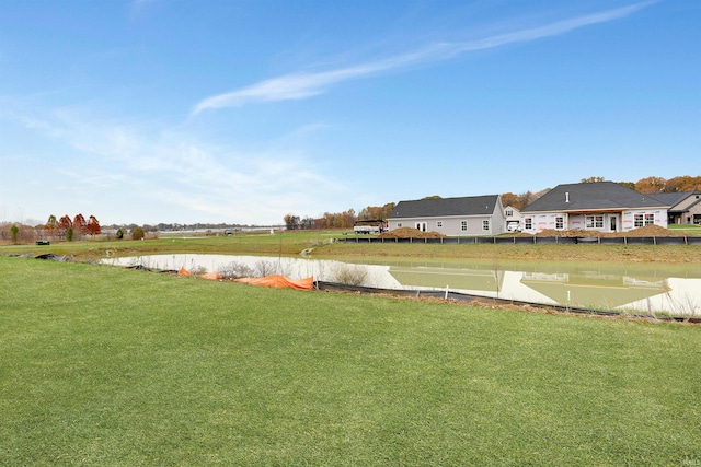 view of yard with a water view