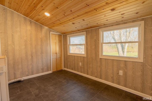 tiled empty room with wood walls and wood ceiling