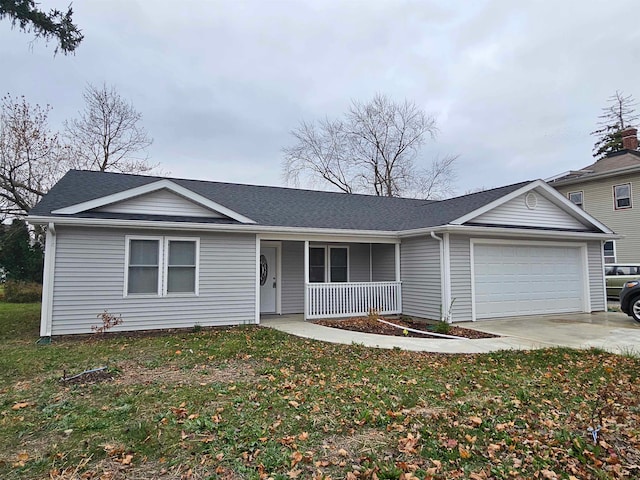 ranch-style home with a garage, covered porch, and a front yard