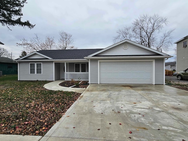 ranch-style house with covered porch and a garage