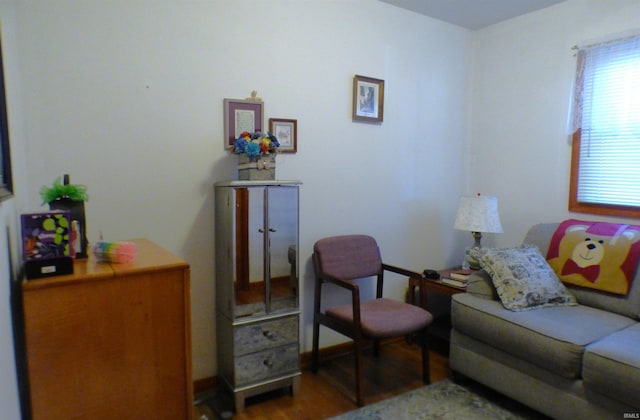 208 Sycamore St, Loogootee, IN 47553 - living room featuring wood finished floors