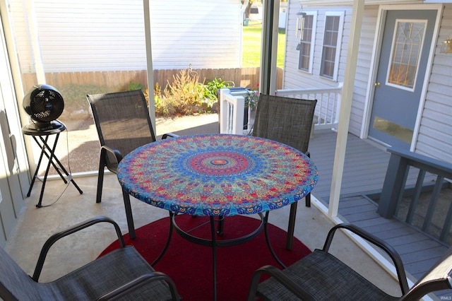 208 Sycamore St, Loogootee, IN 47553 - sunroom / solarium with outdoor dining space