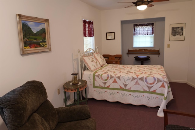 208 Sycamore St, Loogootee, IN 47553 - carpeted bedroom featuring a ceiling fan and baseboards