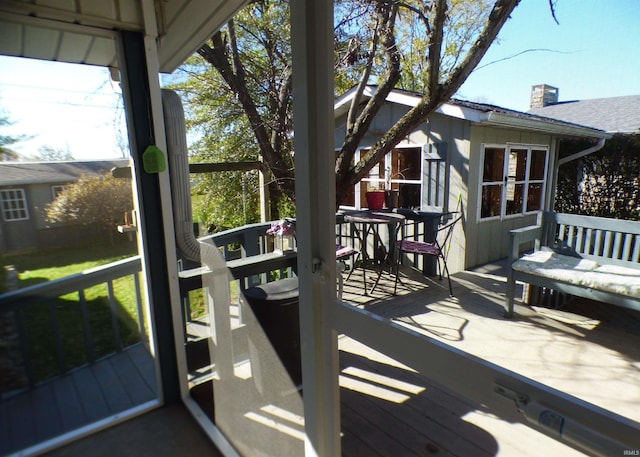 208 Sycamore St, Loogootee, IN 47553 - wooden deck with outdoor dining space