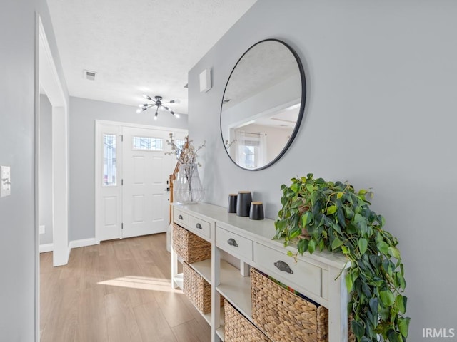 entrance foyer featuring light hardwood / wood-style floors