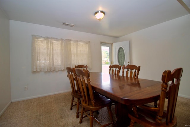 dining area with carpet floors