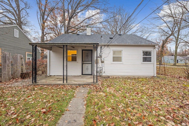 rear view of property featuring a patio