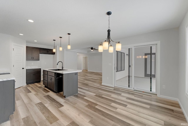15384 Brimwillow Dr, Huntertown, IN 46748 - kitchen featuring a sink, light wood-style floors, open floor plan, and recessed lighting