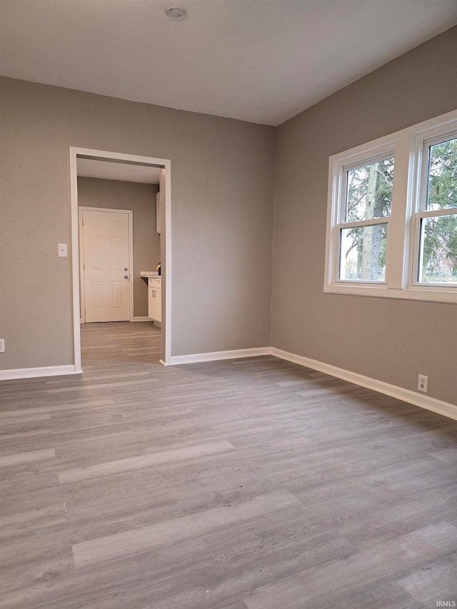 empty room featuring light hardwood / wood-style floors