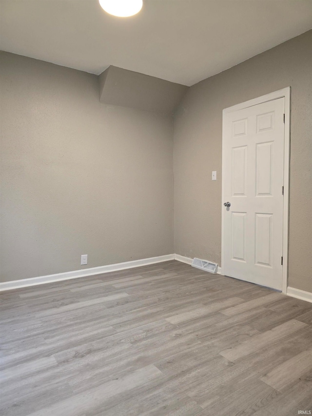 empty room featuring light hardwood / wood-style floors