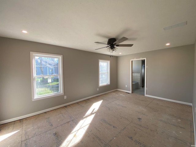 empty room featuring ceiling fan