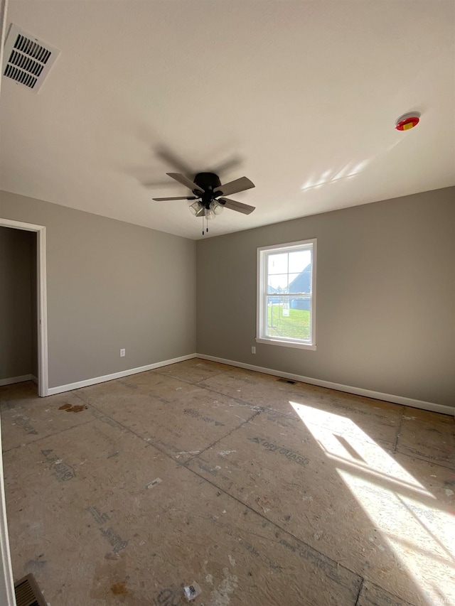 unfurnished room with ceiling fan