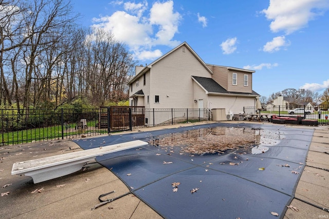 view of swimming pool with a fenced in pool, a patio area, and fence