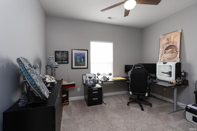 office area with ceiling fan and carpet floors